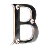 This is an image of Timco - Door Letter B - Polished Brass 64mm (1 Each Bag) 200113